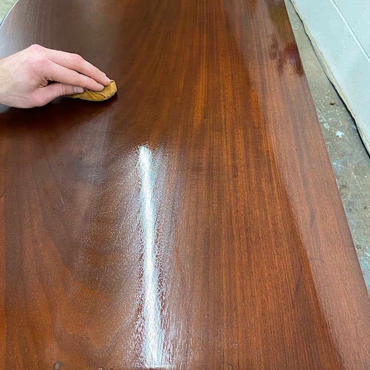French polishing with a rubber