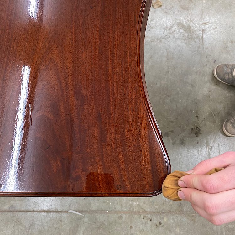 Spiriting off French Polish with a rubber